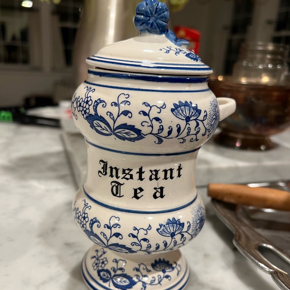 Vintage 7” tall Blue Onion tea canister.